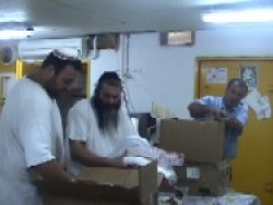 Unpacking supplies to Northern residents