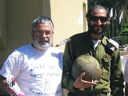 volunteer giving soldier mishloach manot