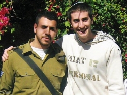 volunteer giving soldier mishloach manot