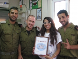 Receiving certificate of thanks from soldiers