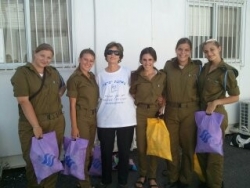 Volunteer with soldiers