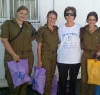 Volunteer with soldiers