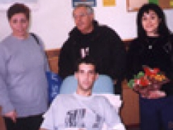 Visiting wounded soldier & family