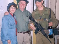 Distributing sandwiches and drinks to soldiers