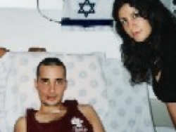 Visiting hospitalized victim of Northern hostilities